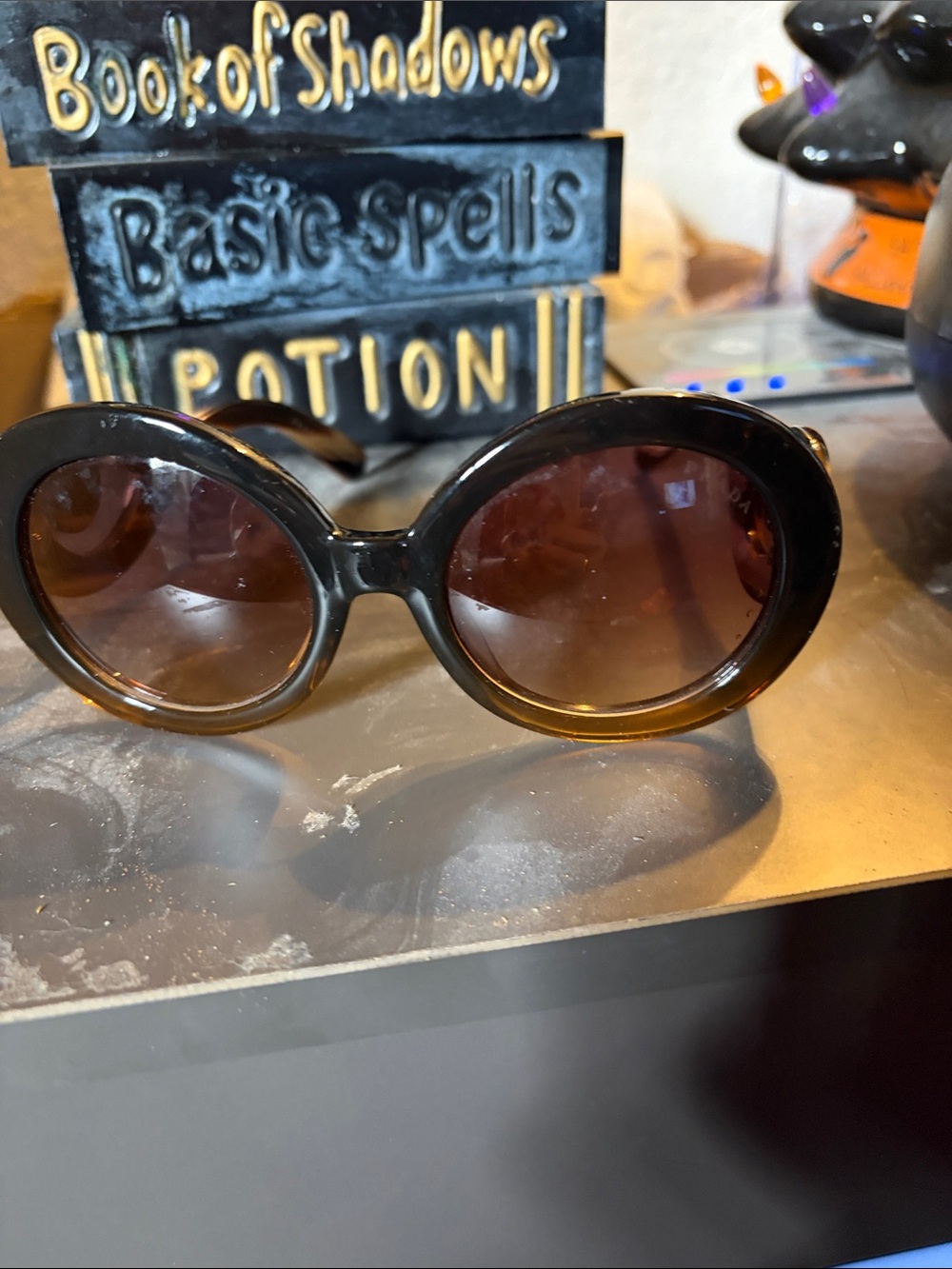 Prada Brown Oval Sunglasses with Gradient Lenses